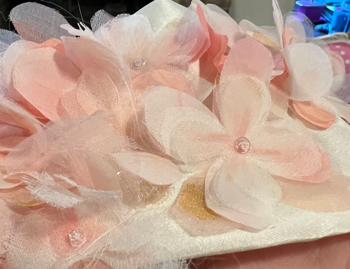 Closeup of Pink Silk Flower Sash