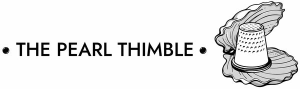 A minimalist black and white graphic featuring the text 'THE PEARL THIMBLE' next to a stylized illustration of a pearl thimble nestled in a shell, set against a solid white background.